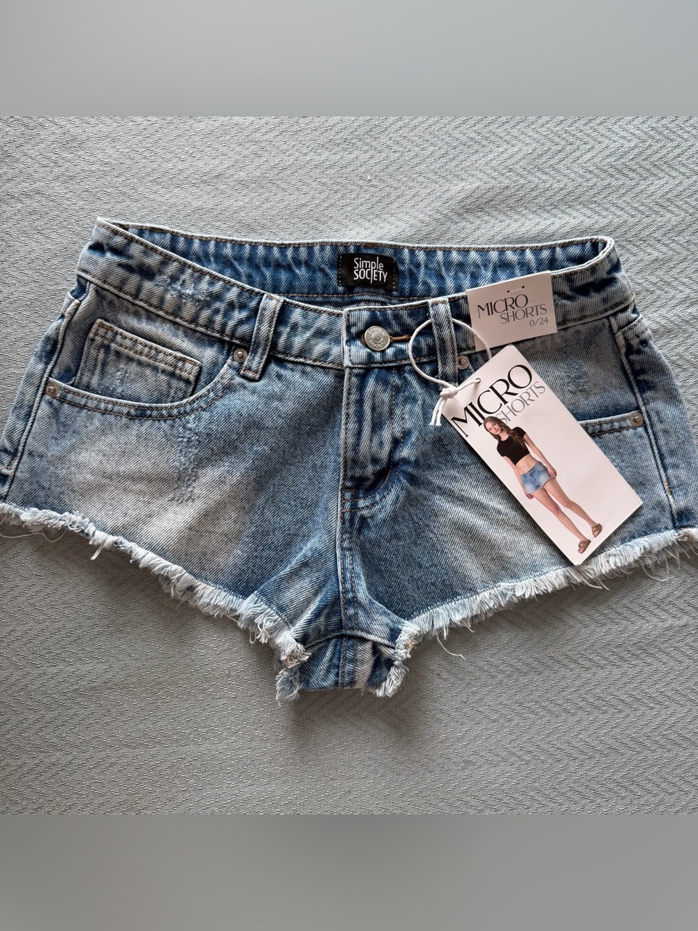 SIMPLE SOCIETY Light Wash Denim Micro Shorts with Frayed Hem Size 0 / 24 MWT